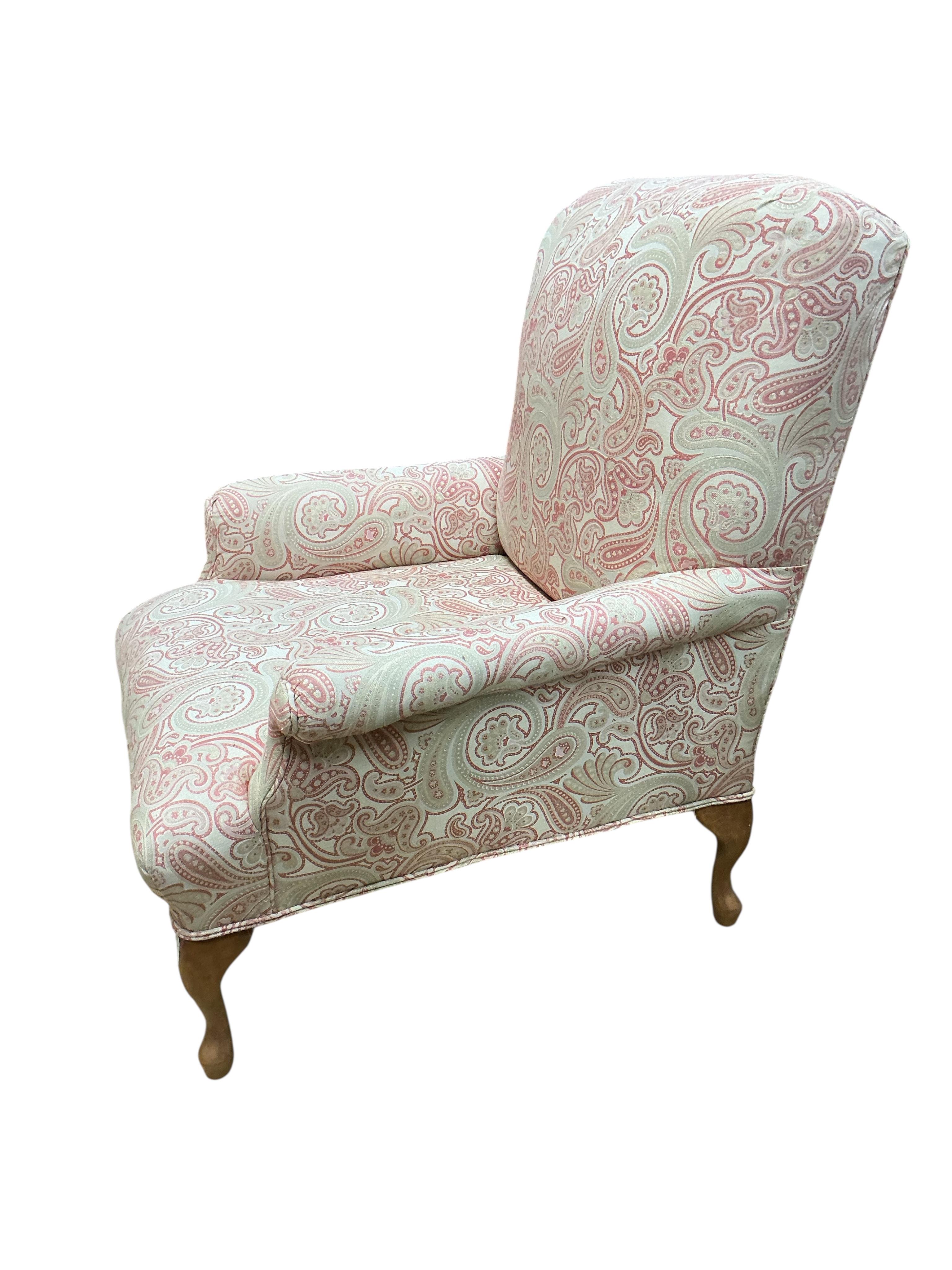 A Victorian style upholstered armchair, width 80cm, depth 78cm, height 98cm